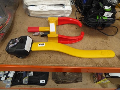 Lot 4566 - Wheel clamp and a steering wheel clamp with keys