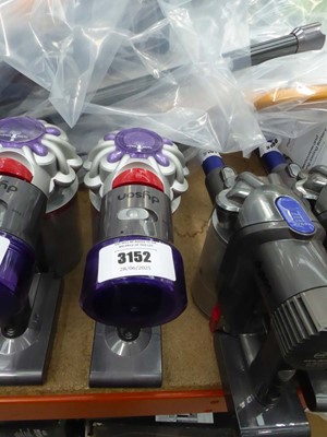 Lot 3152 - Handheld Dyson V8 with pole, charger, and...