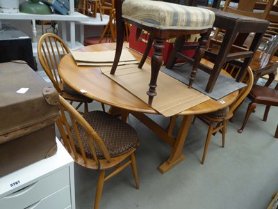 Lot 5209 - Ercol drop-side table and 4 stick back chairs