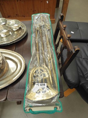 Lot 5216 - 3 piece brass fire companion set