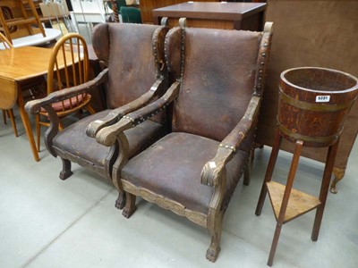 Lot 5230 - Pair of heavily carved armchairs with leather...