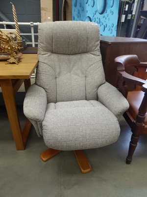 Lot 5336 - Fabric swivel armchair