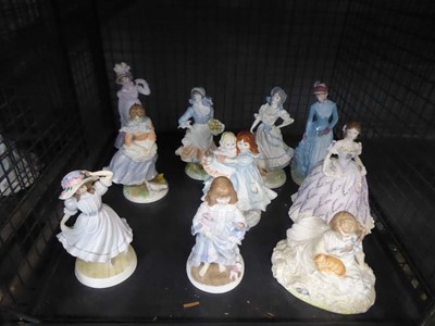 Lot 5528 - Cage containing Royal Worcester lady figures