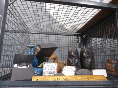 Lot 5561 - Cage containing carved wooden African book...
