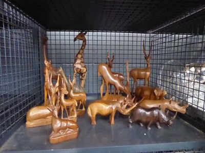 Lot 5563 - Cage containing carved African animals