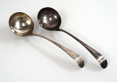 Lot 303 - A pair of George III silver ladles by Hester...
