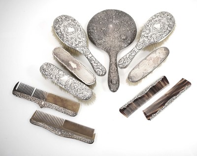 Lot 320 - A group of silver-mounted dressing table items...