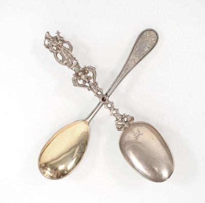 Lot 325 - An 800-grade silver and parcel gilt spoon,...