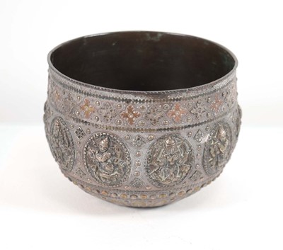 Lot 327 - An Indian copper, brass and white metal bowl...
