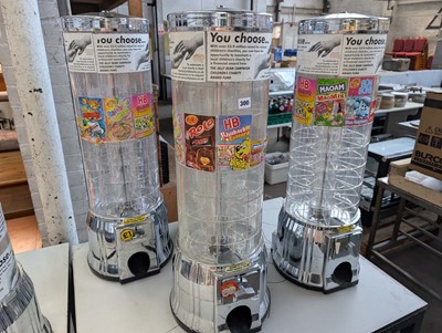 Lot 300 - 4 coin operated sweet vending machines with...