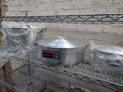 Lot 936 - 3 assorted aluminium cooking pots with lids