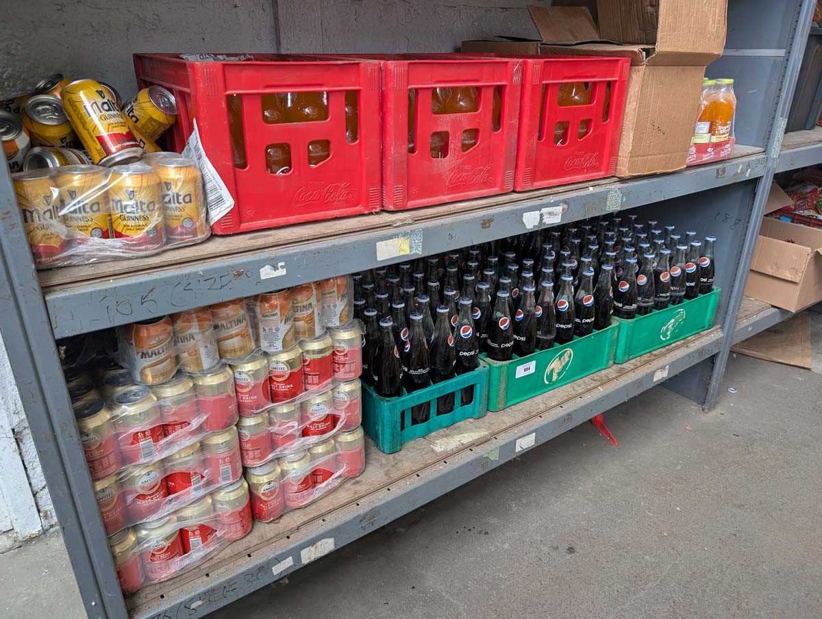 Lot 954 - 2 shelves of various soft drinks (This lot may...