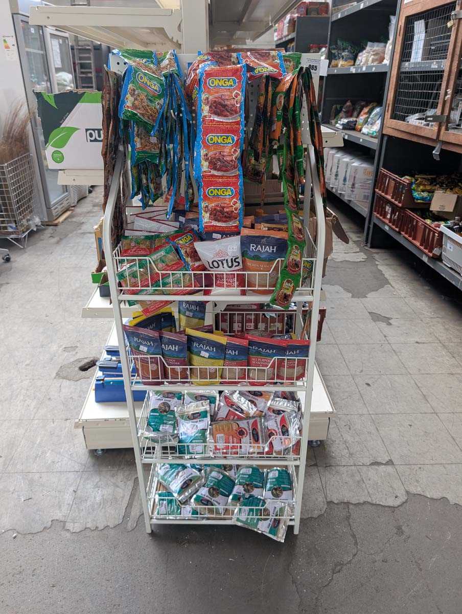 Lot 965 - Display rack containing a large qty of various...