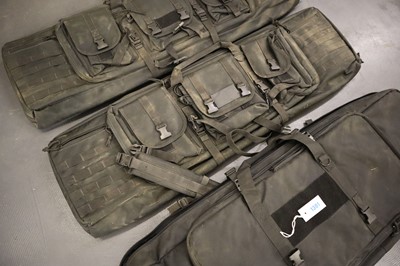 Lot 1301 - 3x black multi-compartment canvas gun slips