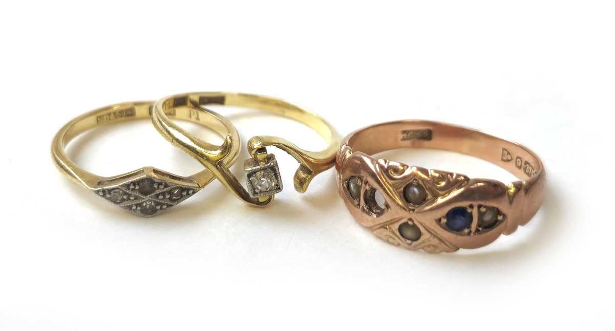 Lot 414 - Two yellow metal and diamond rings marked...