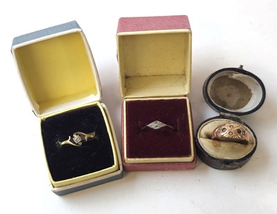 Lot 414 - Two yellow metal and diamond rings marked...