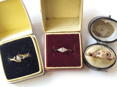 Lot 414 - Two yellow metal and diamond rings marked...