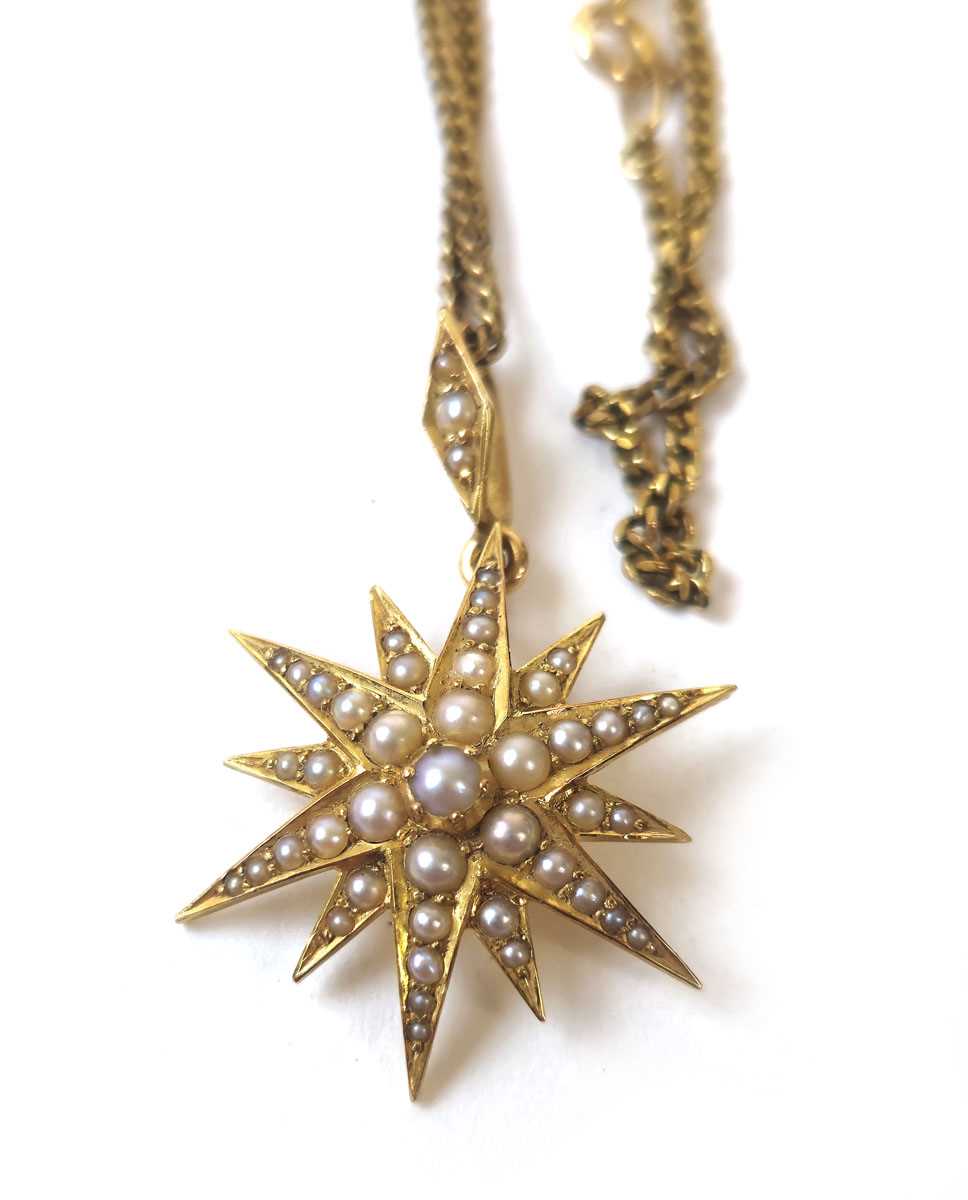 Lot 416 - A 19th century yellow metal and pearl star...