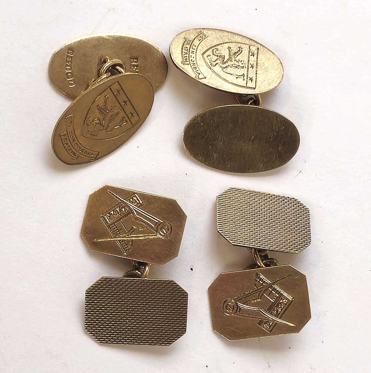 Lot 425 - Two pairs of 9ct gold cufflinks with heraldic...