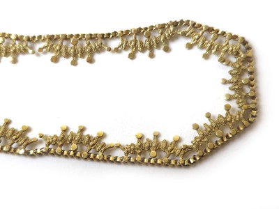 Lot 426 - A 9ct gold necklace of abstract design. Approx....