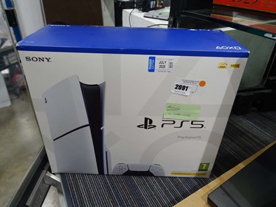 Lot 2091 - Boxed Sony PlayStation 5, missing USB charge...