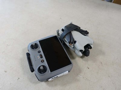 Lot 2069 - Unboxed DJI Mini Drone LWA81 with receiver...