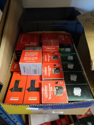 Lot 2129 - A box containing USB plugs, World adaptors,...
