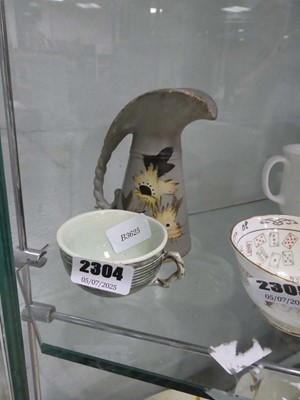 Lot 2304 - Pottery jug and a pottery cup