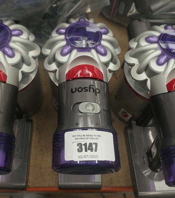 Lot 3147 - Handheld Dyson V8 with pole, charger, and...