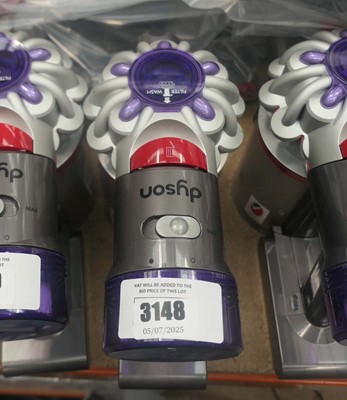 Lot 3148 - Handheld Dyson V8 with pole, charger, and...