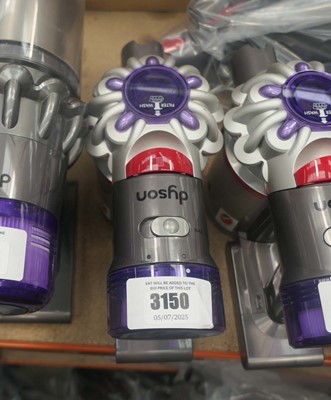 Lot 3150 - Handheld Dyson V8 with pole, charger, and...