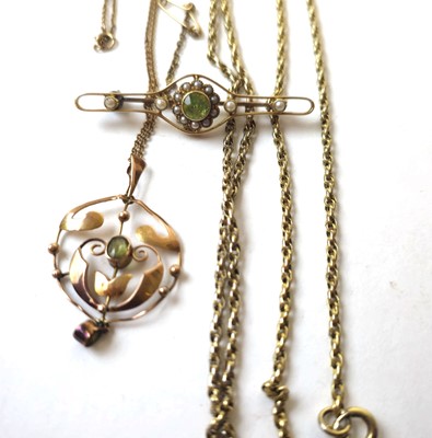Lot 441 - A stud box containing a yellow metal, peridot...