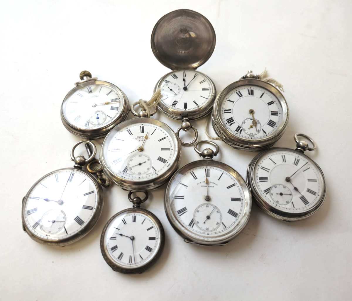 Lot 448 - A collection of eight assorted silver pocket...