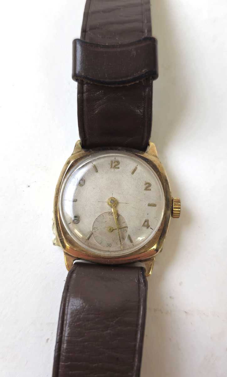 Lot 455 - A 9ct gold cushion cased mechanical wristwatch,...