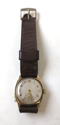 Lot 455 - A 9ct gold cushion cased mechanical wristwatch,...