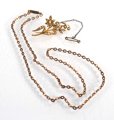 Lot 561 - A 15ct yellow gold brooch set seed pearls in a...