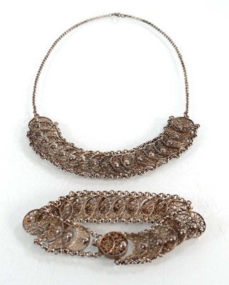 Lot 562 - A group of silver and metalware jewellery...
