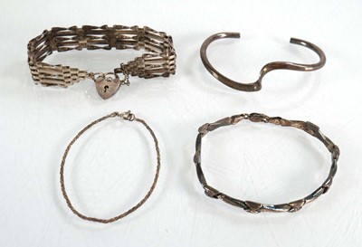 Lot 562 - A group of silver and metalware jewellery...