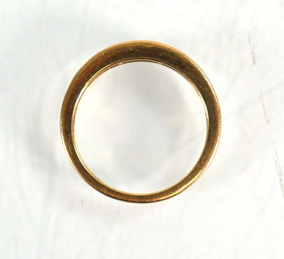 Lot 566 - An 18ct yellow gold half eternity ring set...