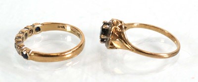 Lot 573 - A 9ct yellow gold sapphire and diamond cluster...
