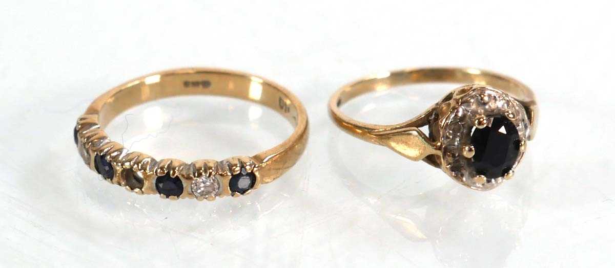 Lot 573 - A 9ct yellow gold sapphire and diamond cluster...