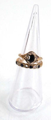 Lot 573 - A 9ct yellow gold sapphire and diamond cluster...