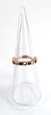 Lot 573 - A 9ct yellow gold sapphire and diamond cluster...