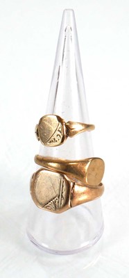 Lot 574 - Three 9ct yellow gold signet rings, ring sizes...