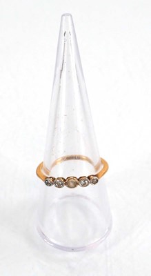 Lot 577 - An 18ct yellow gold and platinum highlighted...