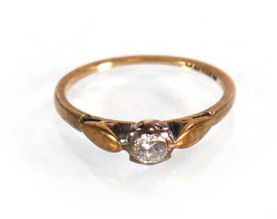 Lot 578 - A 9ct yellow gold ring set small diamond in a...