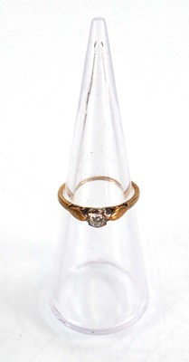 Lot 578 - A 9ct yellow gold ring set small diamond in a...