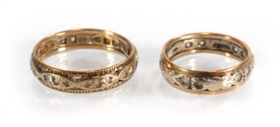 Lot 579 - Two 9ct yellow and white gold eternity rings,...