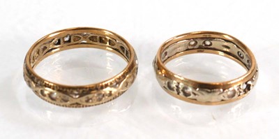 Lot 579 - Two 9ct yellow and white gold eternity rings,...
