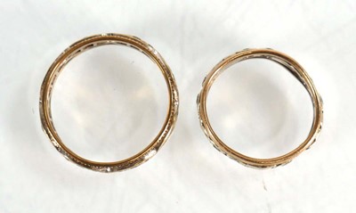 Lot 579 - Two 9ct yellow and white gold eternity rings,...